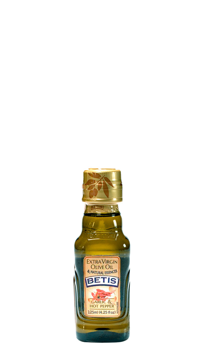Caja de 24 botellas vidrio de 125 ml de aceite de oliva virgen extra BETIS y esencia natural de ajo y guindilla